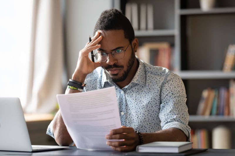 Frustrated man tries to decide how to choose a merchant account for his payment processing needs.